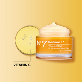 No7 bottle held in hand to show 1.6 fl oz scale and travel-ready convenience