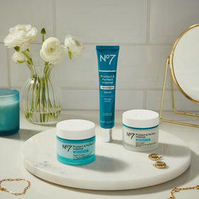 No7 serum being applied to cheek demonstrating absorption and smoothing