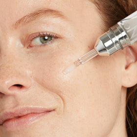 No7 close-up of serum texture on skin, demonstrates lightweight hydrating finish