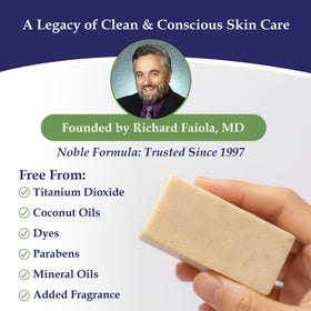 Noble Formula zinc bar on a bathroom tray in a natural setting, suggesting everyday routine appeal