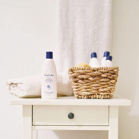 Noodle & Boo close-up of soft white suds highlighting foam texture and moisturizing finish on skin
