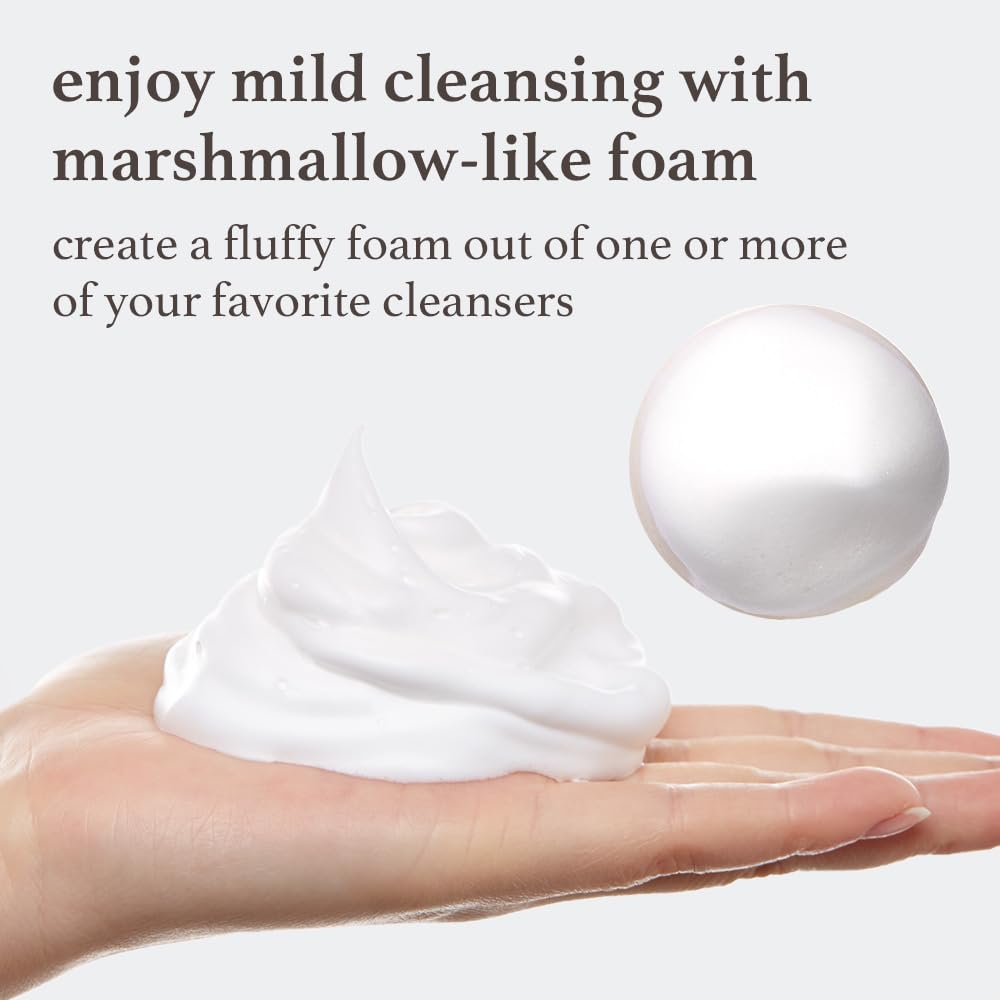 NOONI whipped foam being dispensed by hands showing fast foaming and time-saving benefit