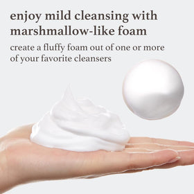 NOONI whipped foam being dispensed by hands showing fast foaming and time-saving benefit