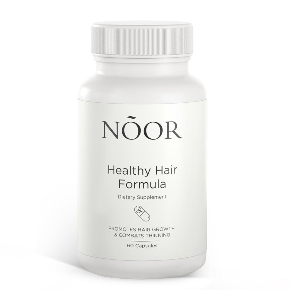 NOOR HAIR front packaging showing bottle and label for visible growth support