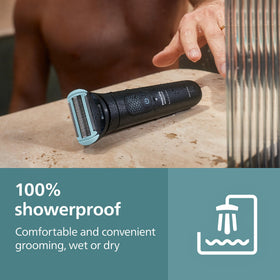 Norelco OptiLight illuminating target area for precise, visible grooming