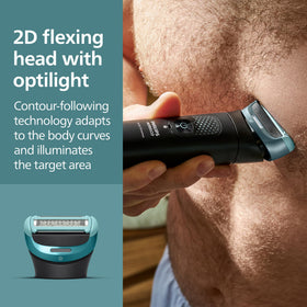 Norelco body groomer being used in shower to show waterproof wet and dry use