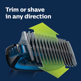 Norelco Bodygroom beside AA battery showing included power and travel readiness