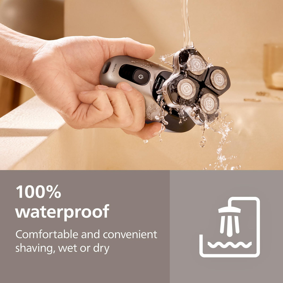 Norelco Head Shaver used in shower for wet shaving versatility