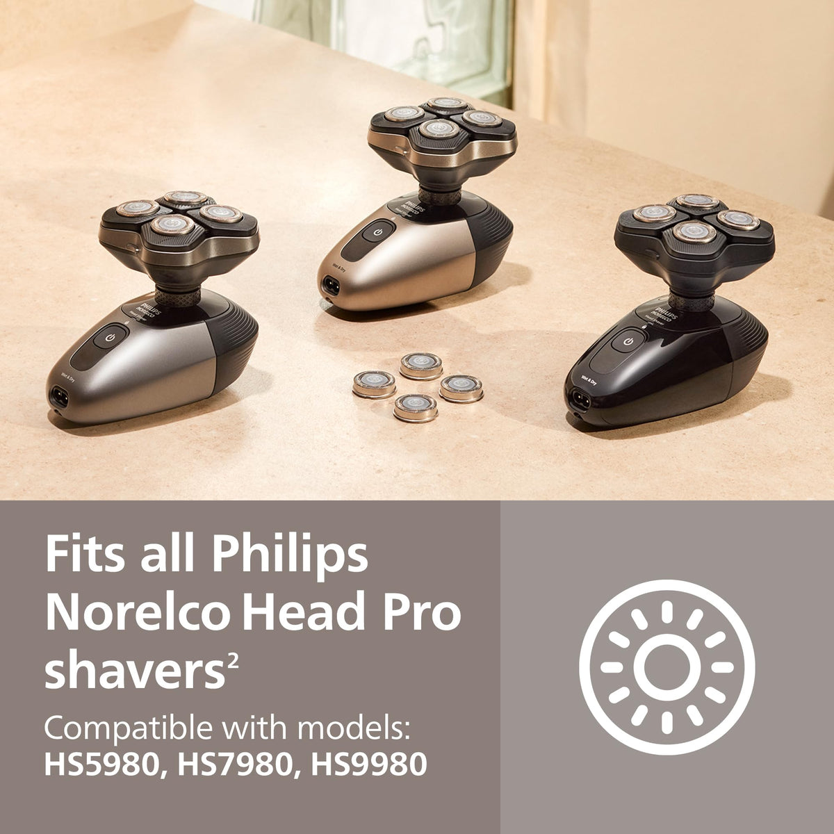 Norelco replacement heads being rinsed in shower demonstrating wet use