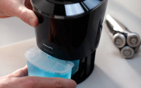 Norelco cartridges on bathroom counter showing tidy maintenance benefit