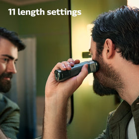 Norelco Multigroom 5000 lifestyle bathroom setup illustrating at-home grooming convenience