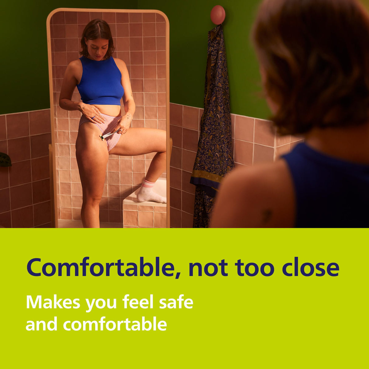 Norelco OneBlade Intimate next to USB-A cable showing convenient rechargeable travel charging