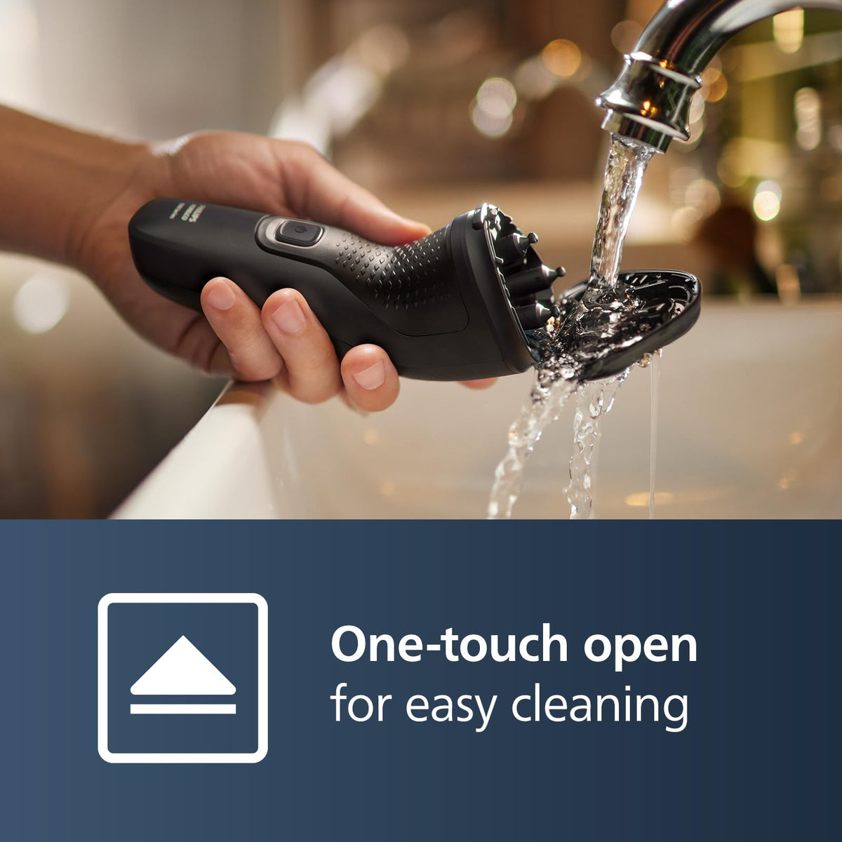 Norelco shaver 1100 rinsing under tap after one-touch open for quick cleaning