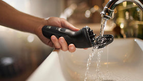 Norelco shaver on bathroom counter in lifestyle scene for daily routine appeal