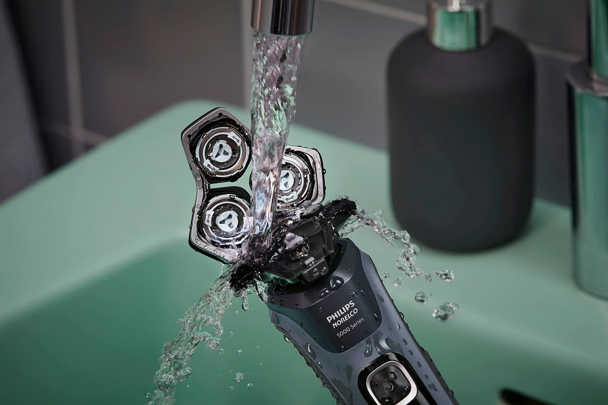 Norelco shaver 5400 blade edge close-up showing SteelPrecision texture for long-lasting sharpness benefit