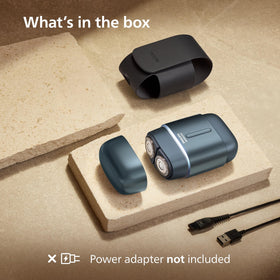 Norelco shaver 700 packaging and includes displaying shaver travel case and included items