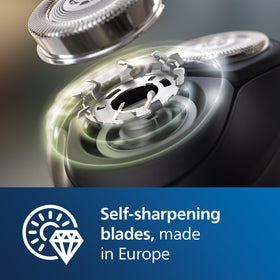 Norelco shaving heads held in hand to show scale and easy installation benefit