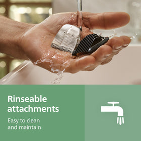 Norelco rinseable combs under running water for easy cleaning and care