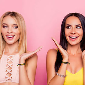 Norme hair tie next to ruler showing 4 inch diameter, clear size reference