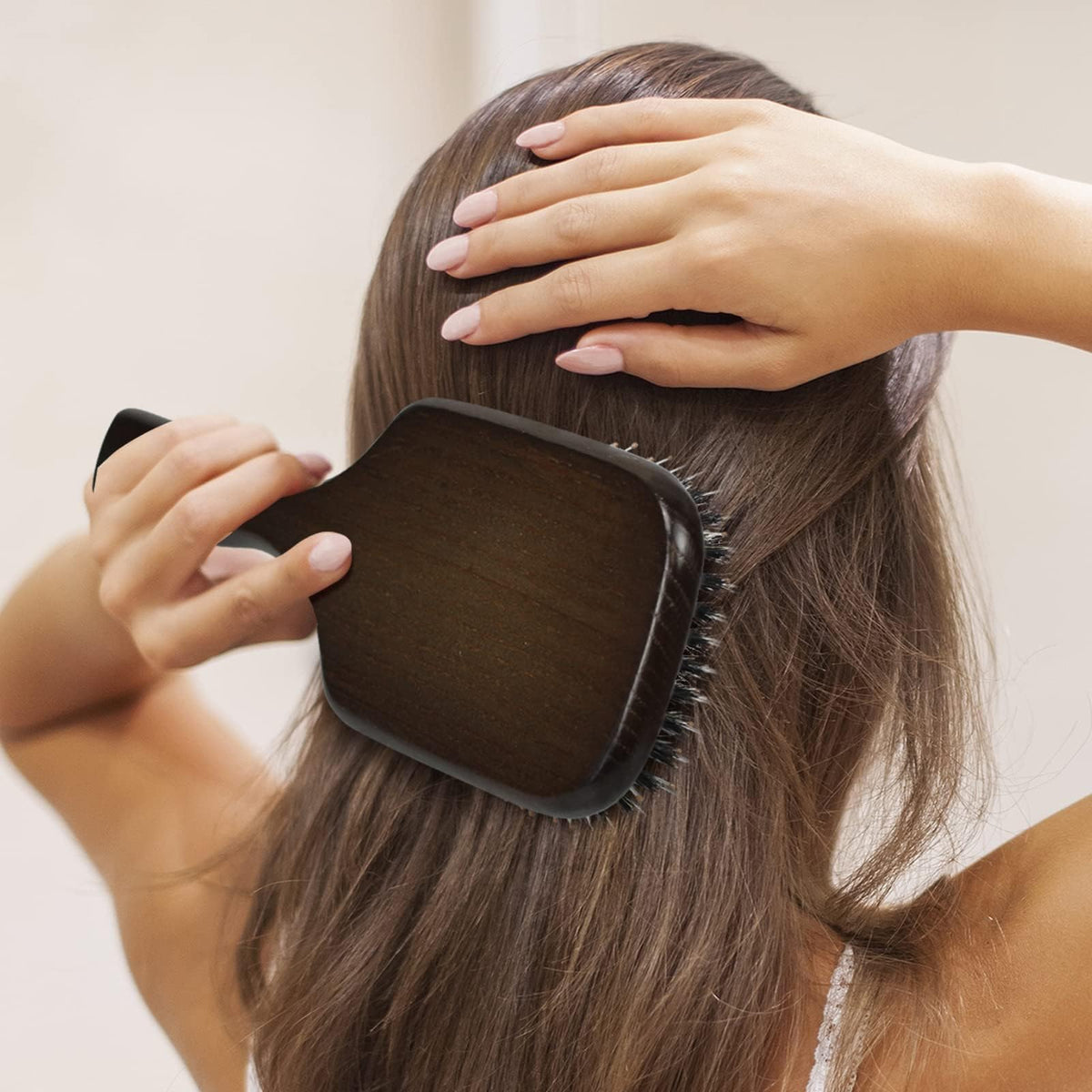 Norsewood brush held in hand for ergonomic grip and control