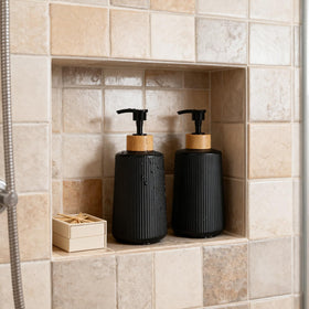 Nortsa Miira underside showing square non-slip base and label benefit: stable placement on wet surfaces