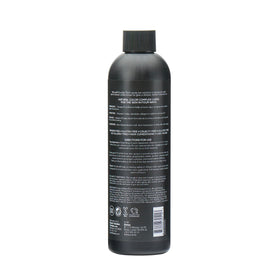 Norvell bottle on vanity setting suggesting daily-use and salon-quality