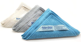 Norwex cloth in bathroom setting used for gentle cleansing and compact travel convenience
