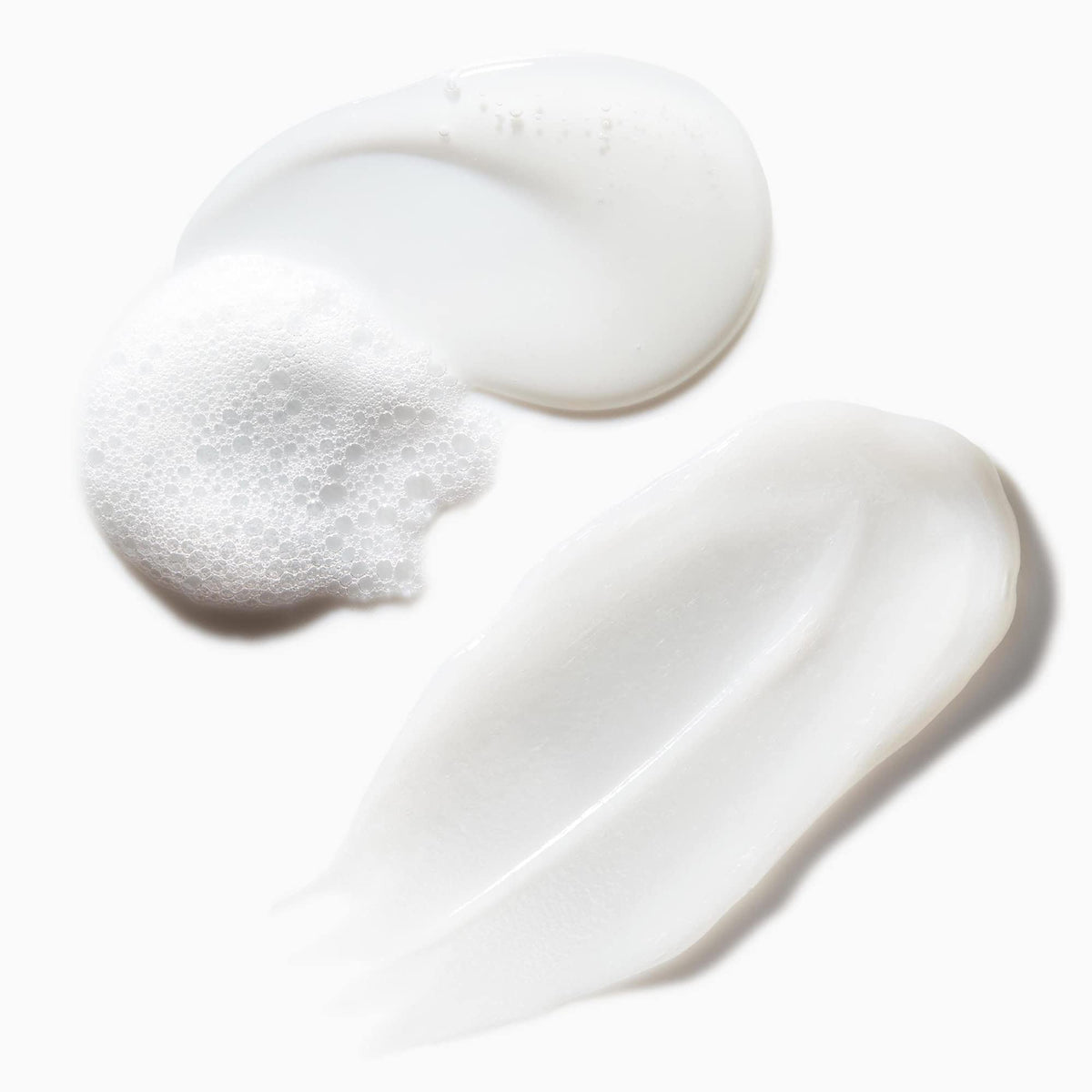 Not Your Mother's shampoo and conditioner staged in bathroom for easy routine benefit