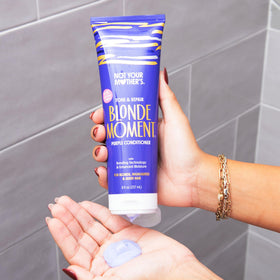 Not Your Mother's conditioner cream texture on fingers, hydrates and smooths lightened hair
