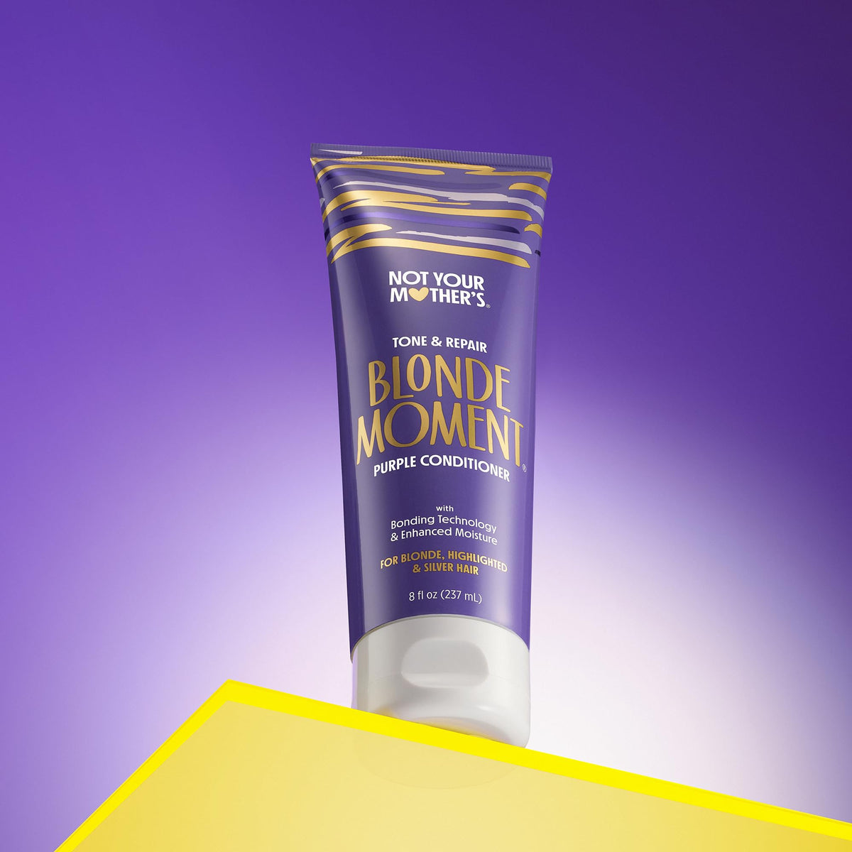 Not Your Mother's shampoo lather on wet hair in shower, tones and cleans without stripping