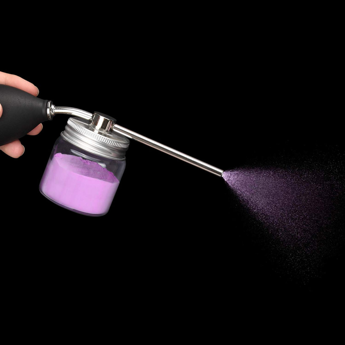 Noverlife held in hand to show compact size and travel convenience