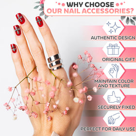 Novsix silver cross charms applied to a press-on nail for instant style