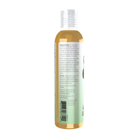 NOW Foods jojoba oil droplet close-up showing lightweight texture