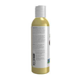 NOW Foods jojoba oil pouring texture on hand demonstrating fast-absorbing, non-greasy feel