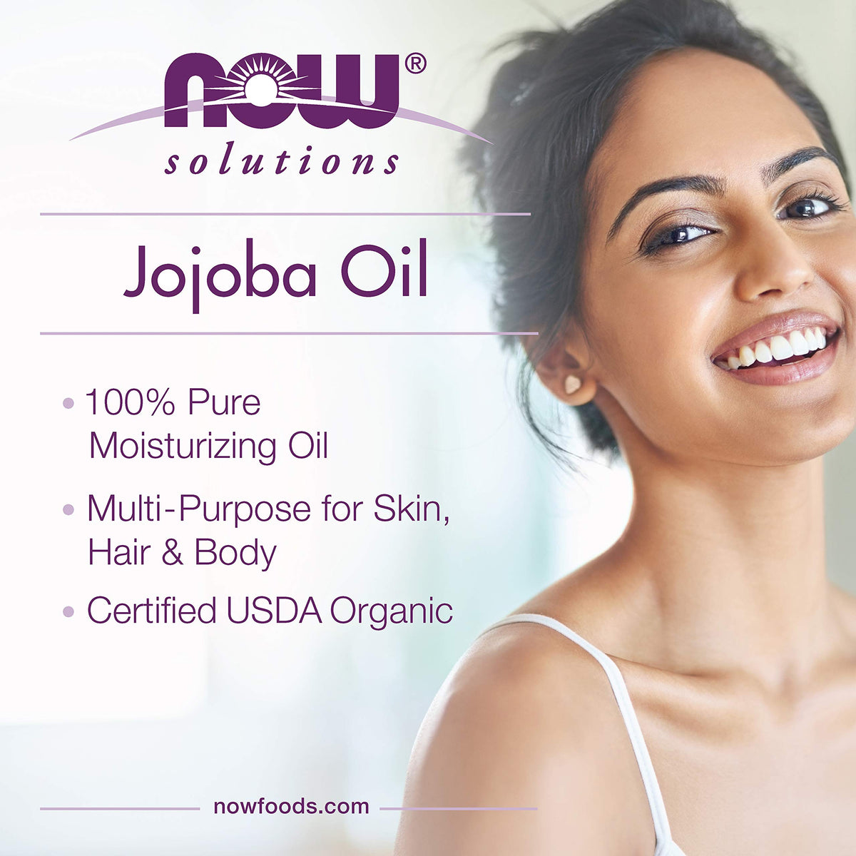 NOW Foods jojoba oil texture on skin demonstrating smooth, non-greasy moisturizing effect