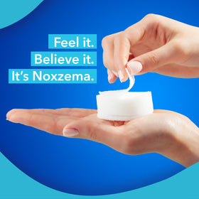 Closeup of Noxzema ingredient label highlighting 2% salicylic acid benefit