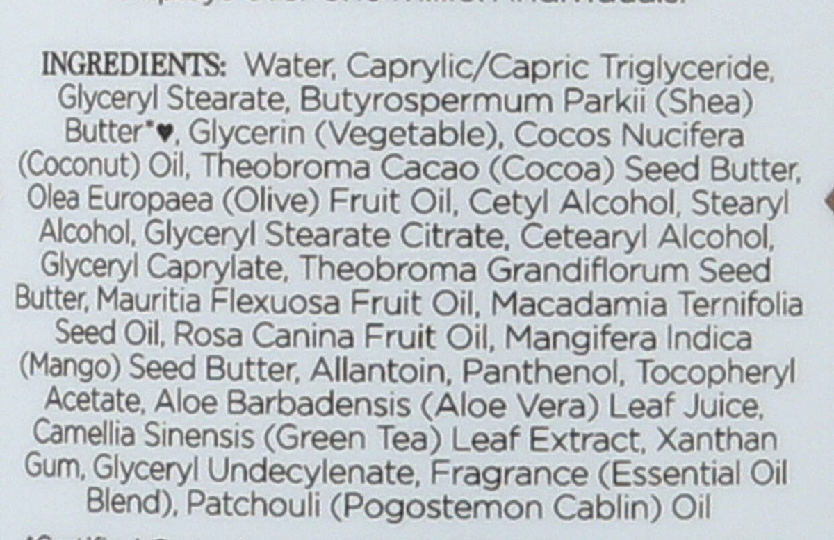 Nubian Heritage lotion texture closeup showing creamy finish and quick absorption