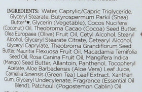 Nubian Heritage lotion texture closeup showing creamy finish and quick absorption