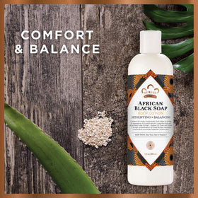 Nubian Heritage lotion being dispensed to show silky texture and quick absorption benefit