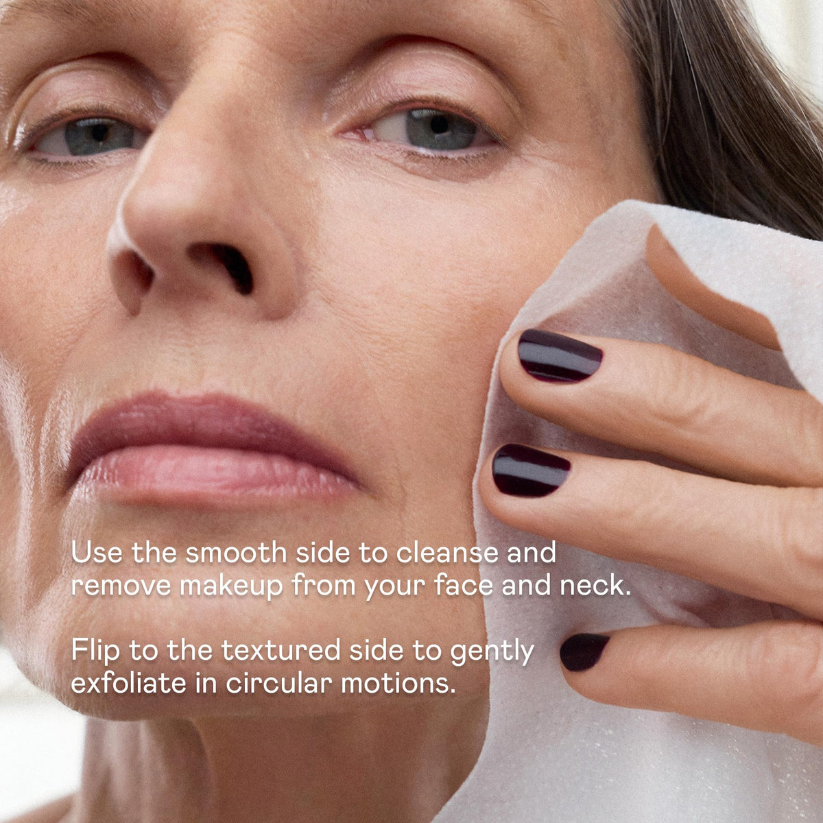 NuFACE wipe held in hand for scale illustrating compact travel size and easy use