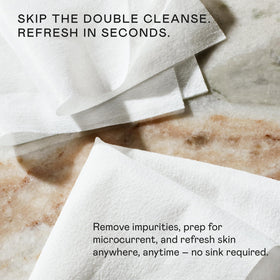 NuFACE wipes styled in a travel pouch highlighting portability and on-the-go convenience