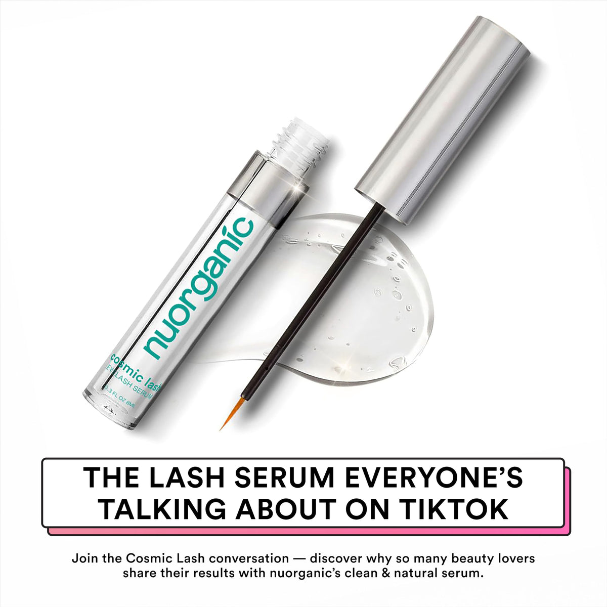 NuOrganic Cosmic Lash serum drop on fingertip showing lightweight texture and quick absorption