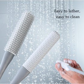 Nurlypop lifestyle shot with elderly user comfortably cleaning feet
