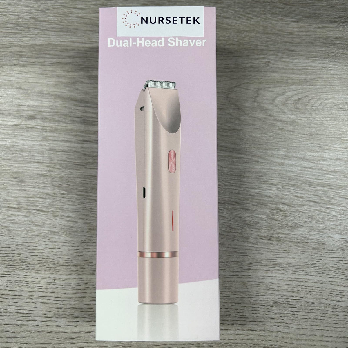 NURSETEK size comparison held in hand to show compact travel-friendly scale