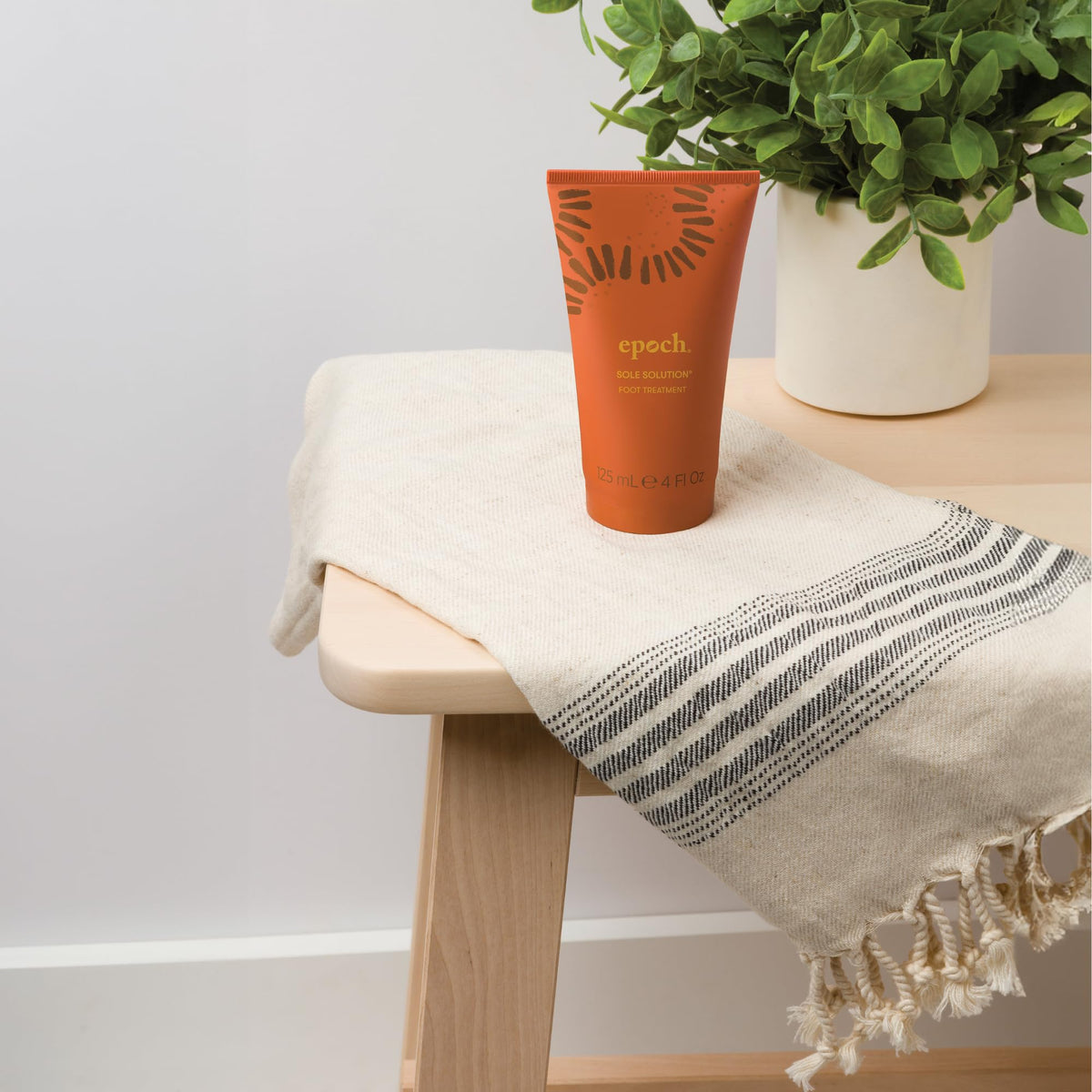 Nu Skin Epoch Sole Solution with baobab visual showing natural botanical conditioning