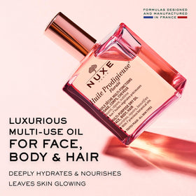 NUXE dry oil texture close-up illustrating lightweight finish and non-greasy absorption benefit