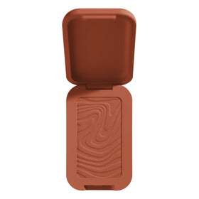 NYX Professional Makeup close-up of bronzer pan texture showing buttery finish