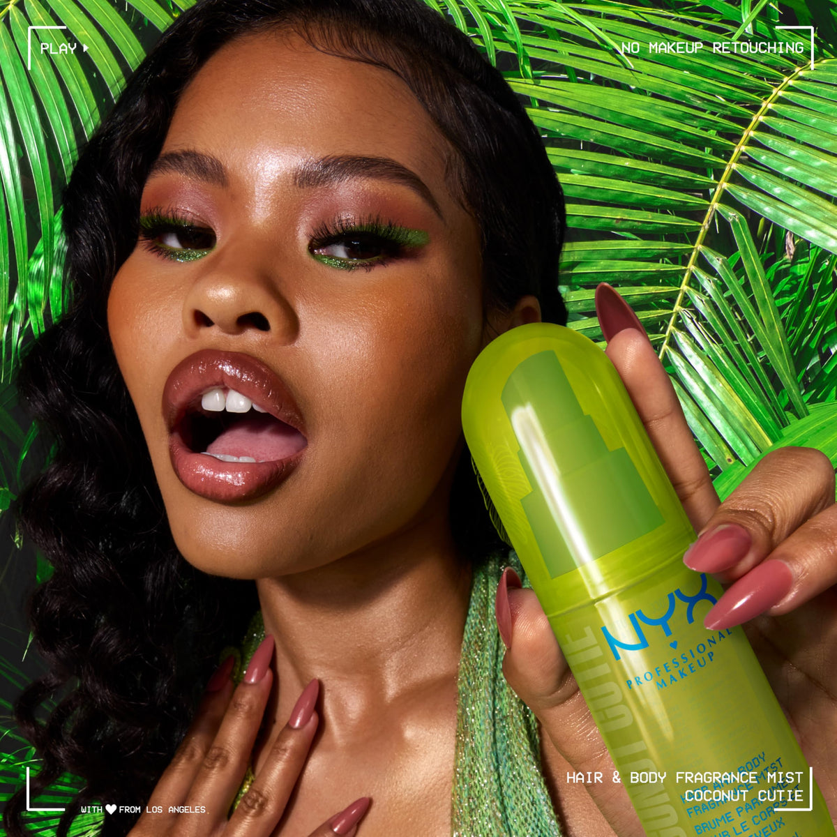 NYX PROFESSIONAL MAKEUP spraying mist into hair for lightweight scent