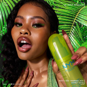 NYX PROFESSIONAL MAKEUP spraying mist into hair for lightweight scent