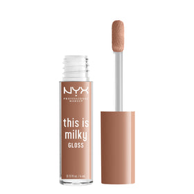 NYX PROFESSIONAL MAKEUP tube next to lip balm showing compact travel-friendly size